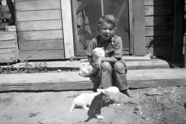 George Vance on the steps of the original house